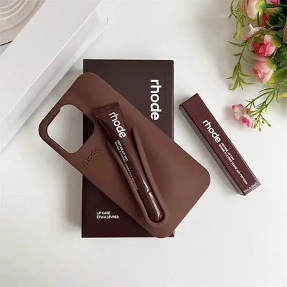 Trendy Phone Case with Lip Care Holder, Soft Touch Silicone Cover for Iphone 11–17 Series.